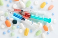stock-photo-18580239-syringes-and-pills