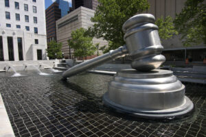 "Giant Gavel" by Sam Howzit is licensed under CC BY 2.0. Copy text